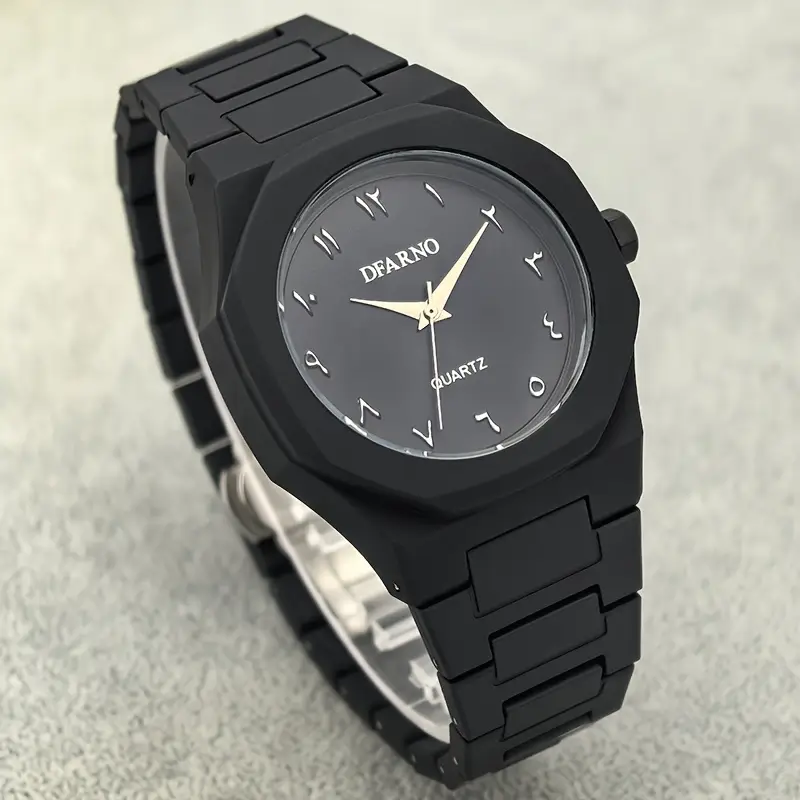 Close-up of a black Arabic dial watch featuring Eastern Arabic numerals on a textured background.